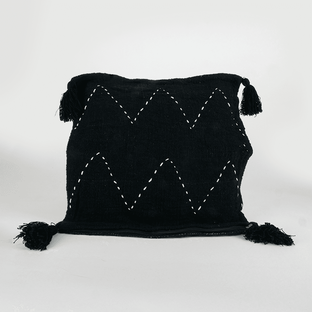 Housse de coussin noire à motifs blanc